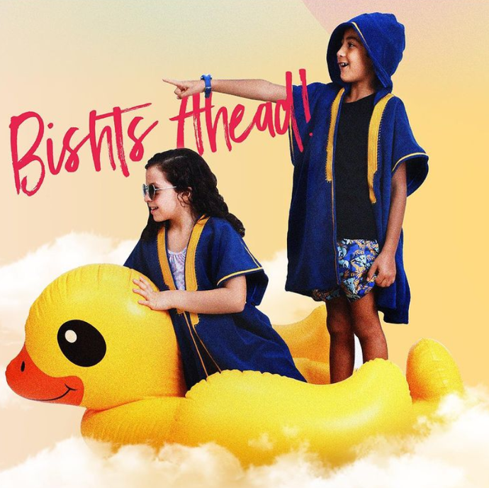 Bisht Ahead Kids wearing Beach Bisht Kids Hoodie Navy Color Our Mission is to naturally inspire and excellence the experience of an active outdoor lifestyle accessible for everyone